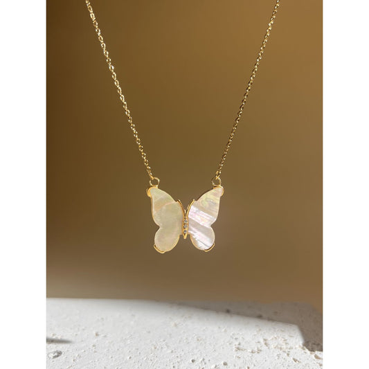 ogrlica s visuljkom, pendulum necklace, ZAYA x COSMOS, ogrlica sa sedefom, vodootporni nakit, simboličan nakit, francuski minimalistički nakit, zaya-hr.com, elegantan modni dodatak, nakit za svaki dan, layering necklace, chic suptilna ogrlica, ženski nakit 2025, hypoallergenic necklace, nježan poklon za nju, spiritual jewelry, pokret i ravnoteža, modni detalj sa značenjem
